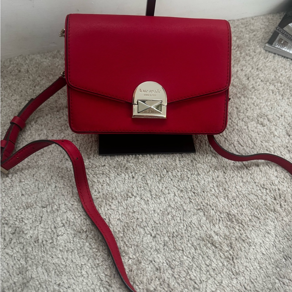 kate spade red leather crossbody with gold-tone clasp